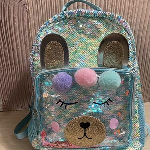 Little girl’s sequin bear backpack